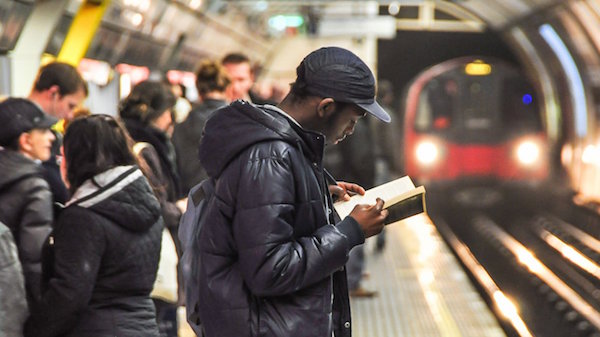 Entrepreneur reading books